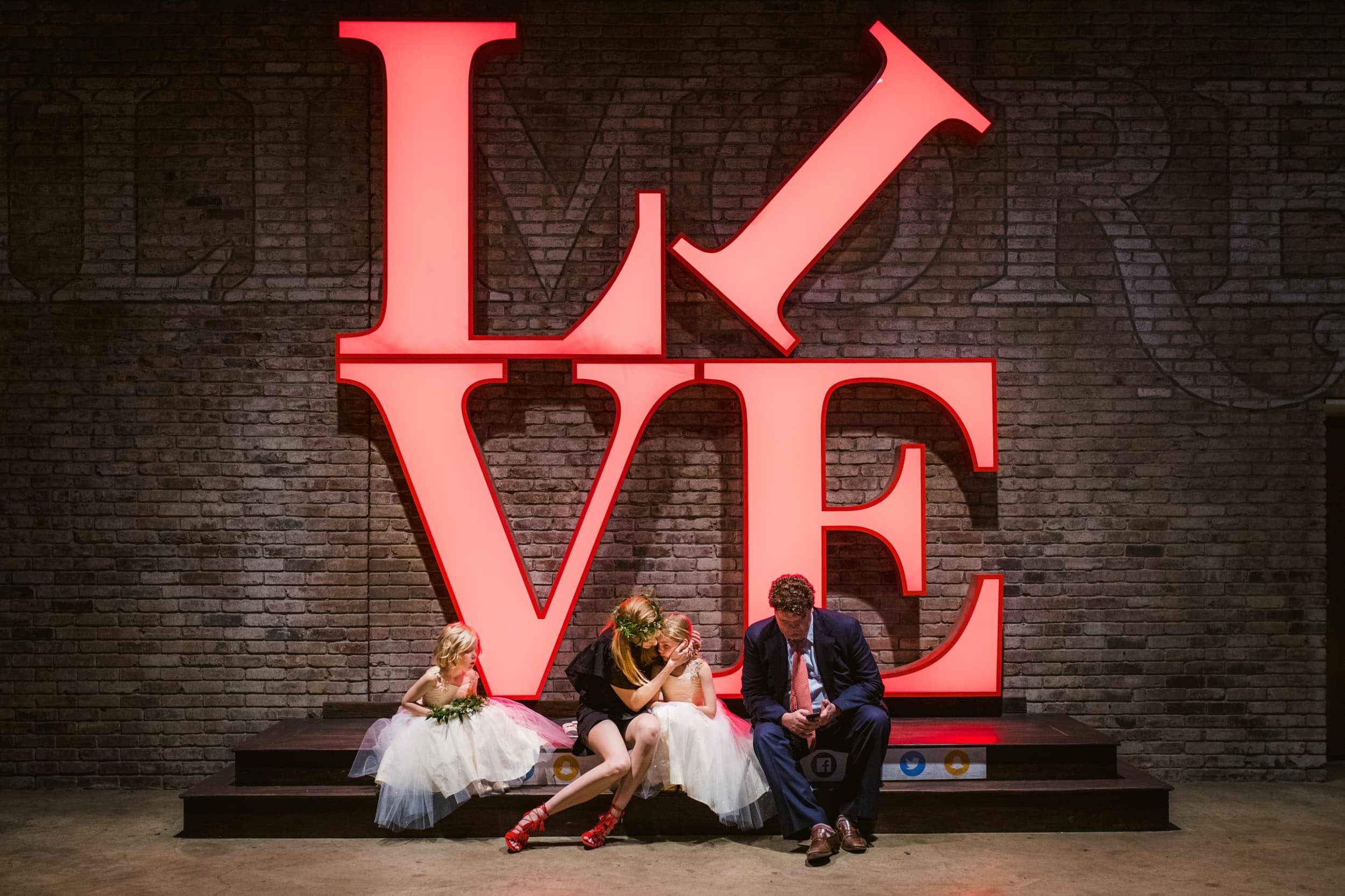 A family having a special moment during a Las Vegas elopement. Photographed by JD Land of Sonderland